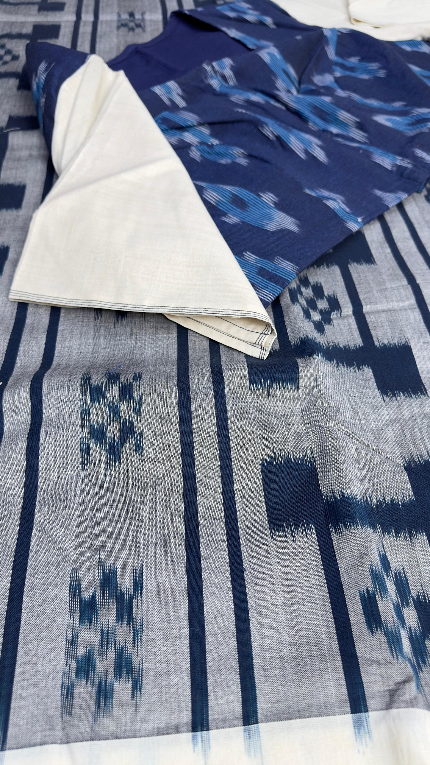 Ikkat cotton saree with our exclusive semi stitched blouses