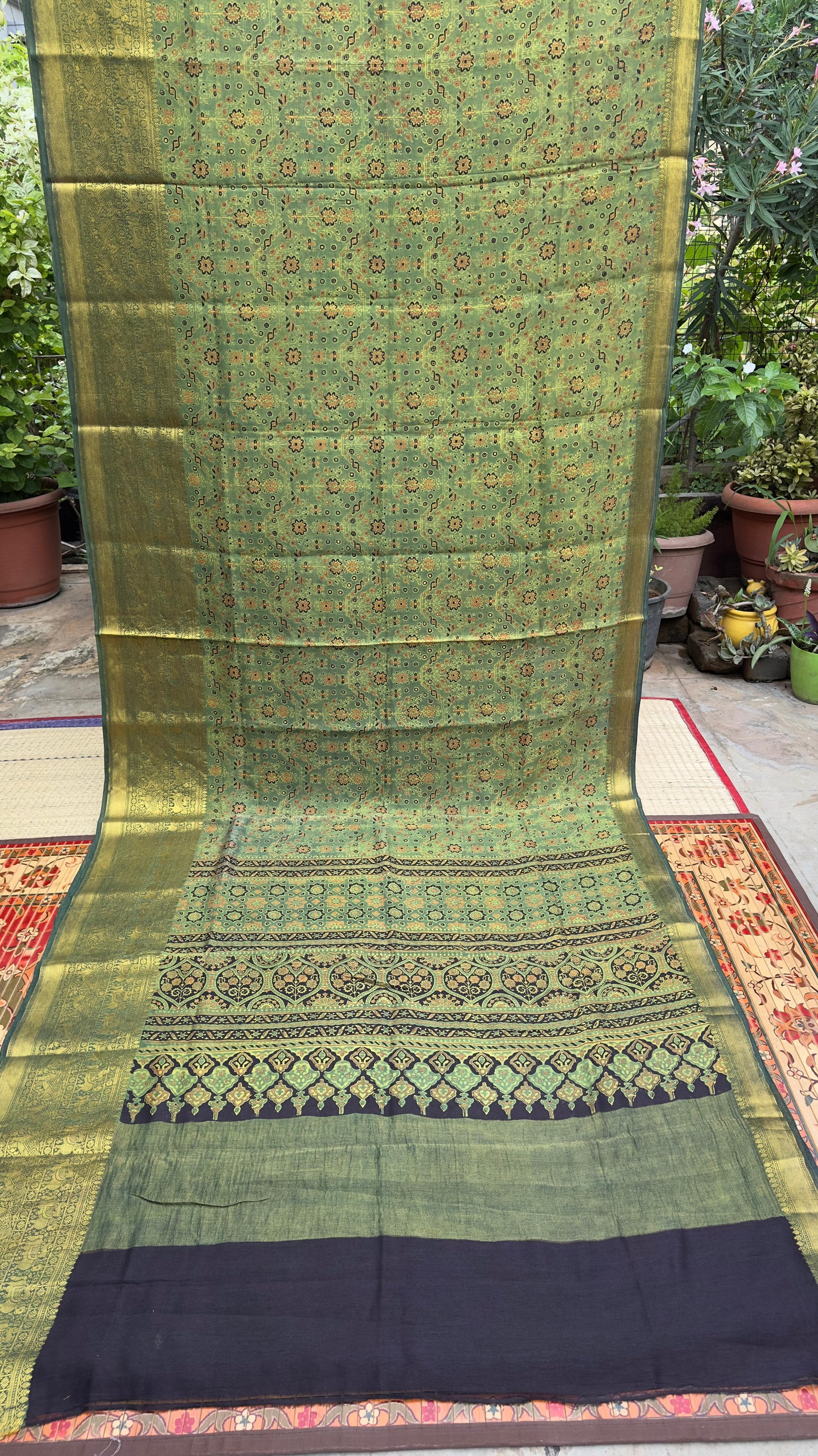Hand block printed Ajrakh on chiniya silk
