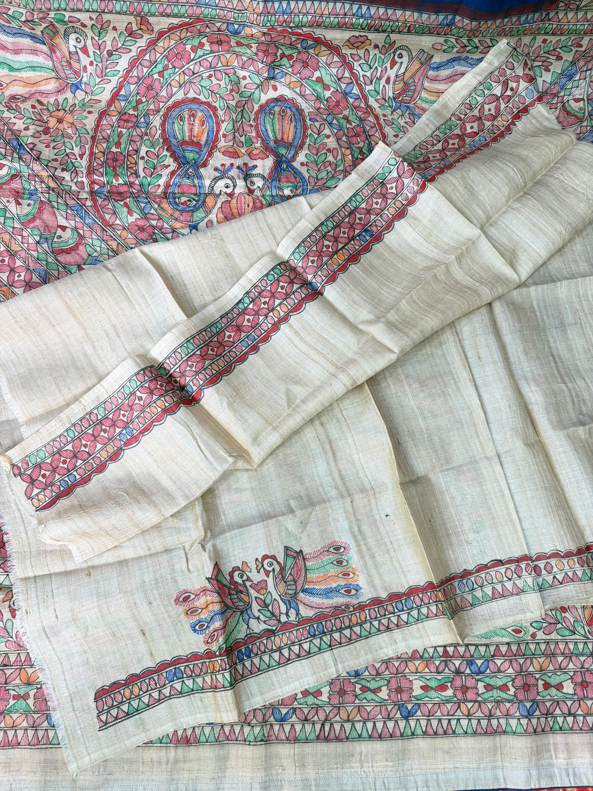 Tussar handknotted Bandhini with hand-drawn Madhubani saree.