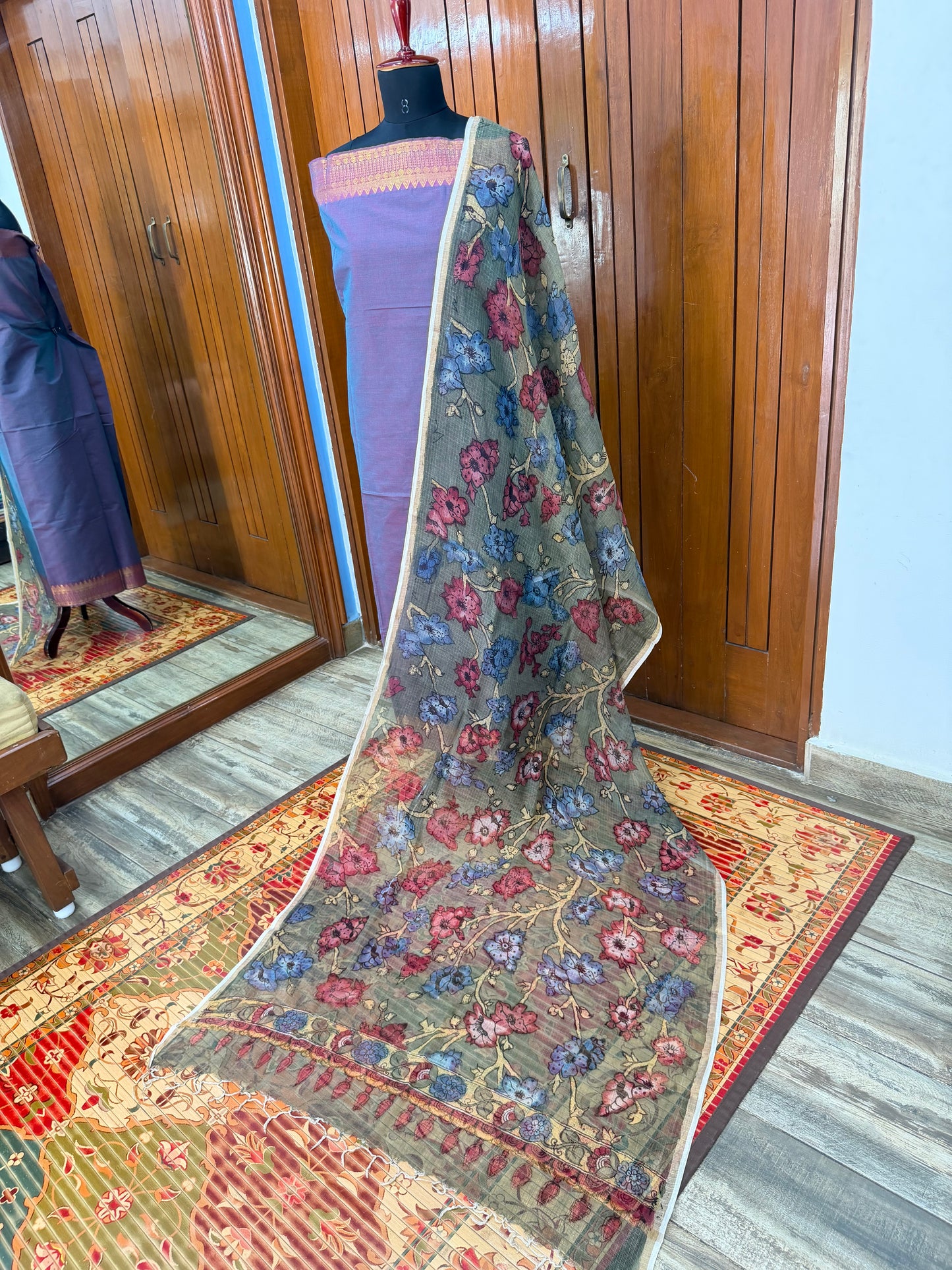 pure cotton kurti material paired with penkalamkari dupatta.