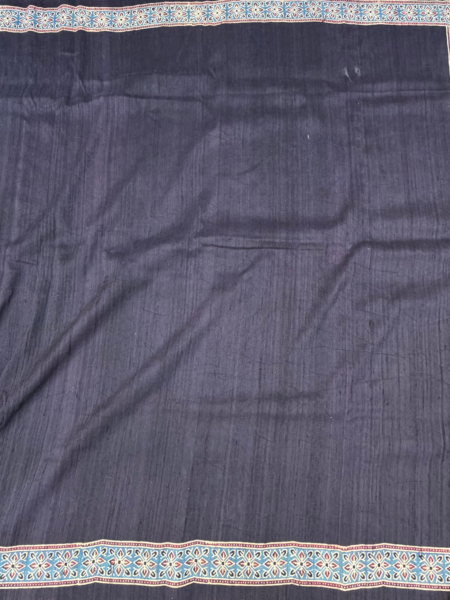 Handblock printed Ajrakh on raw silk sarees