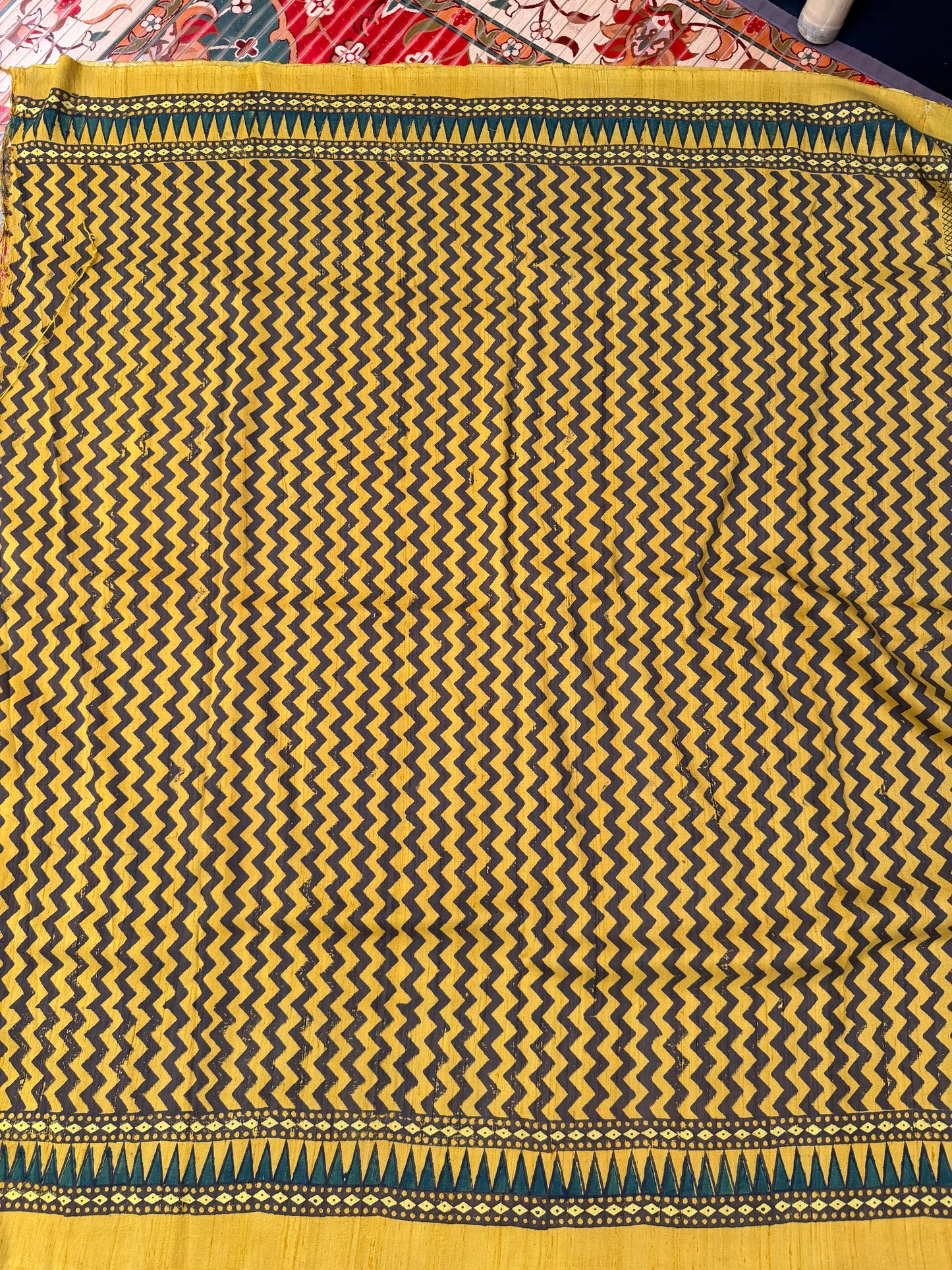 Handblock printed Ajrakh on raw silk sarees