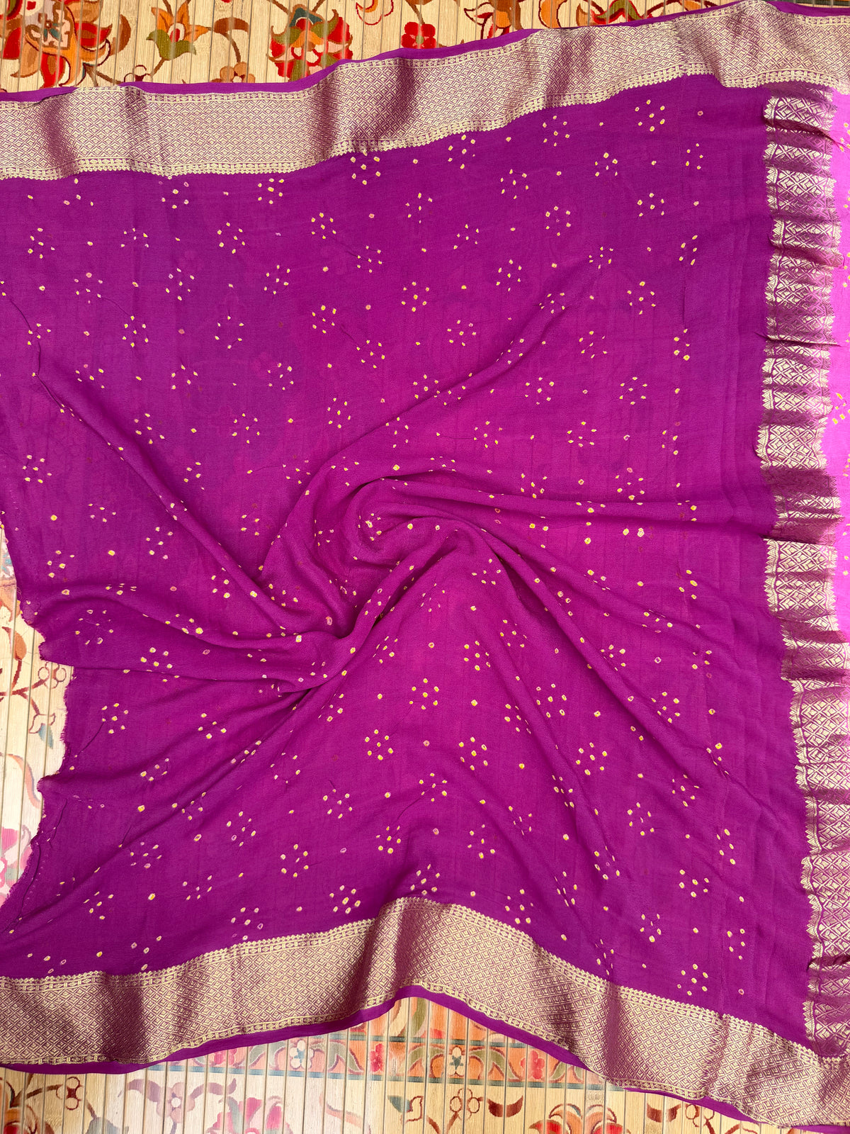 Pure benaras crepe with handknotted bandhini pallus & blouses.