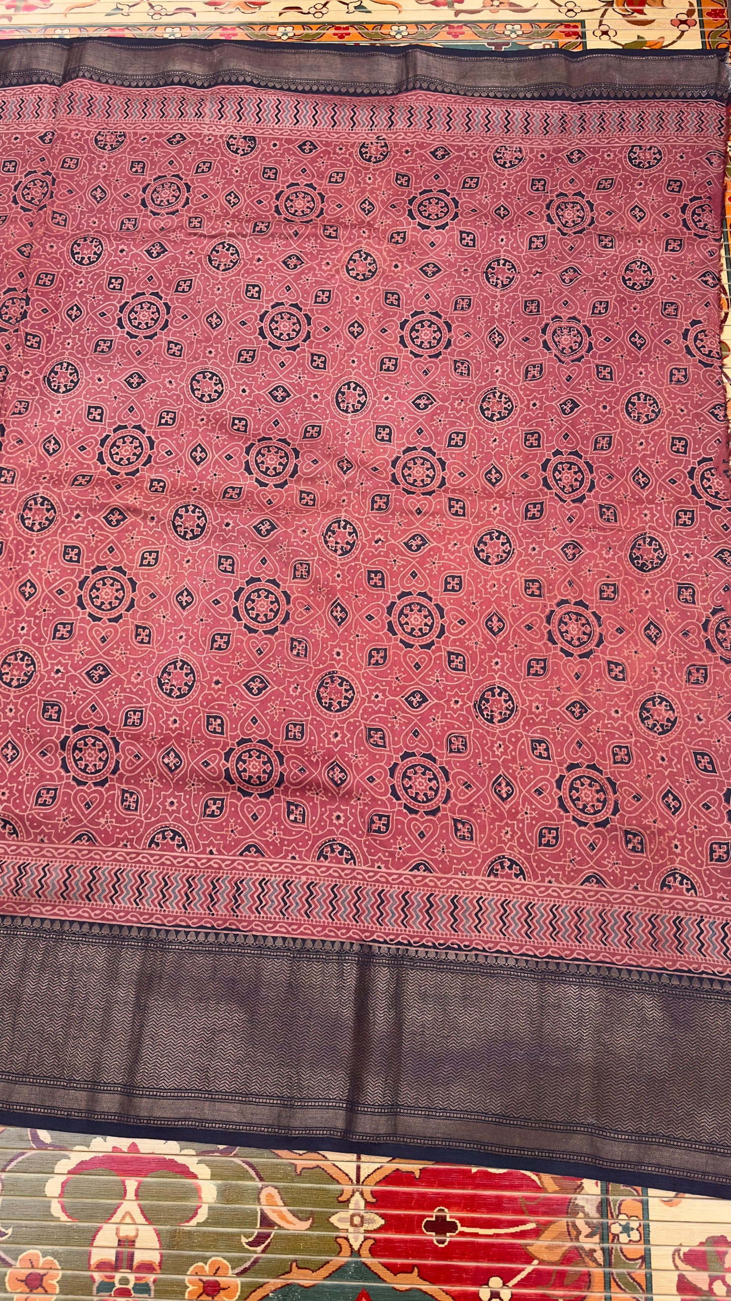 Hand block printed Ajrakh on chiniya silk
