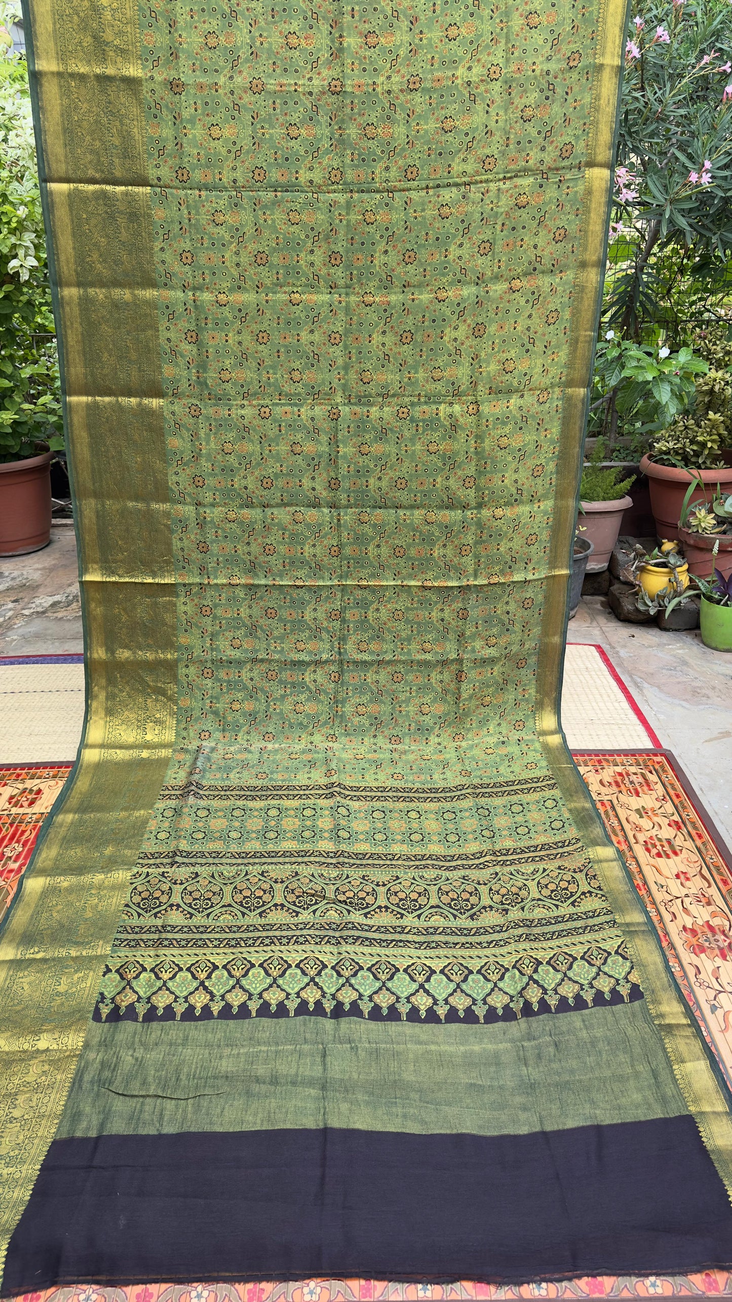 Hand block printed Ajrakh on chiniya silk