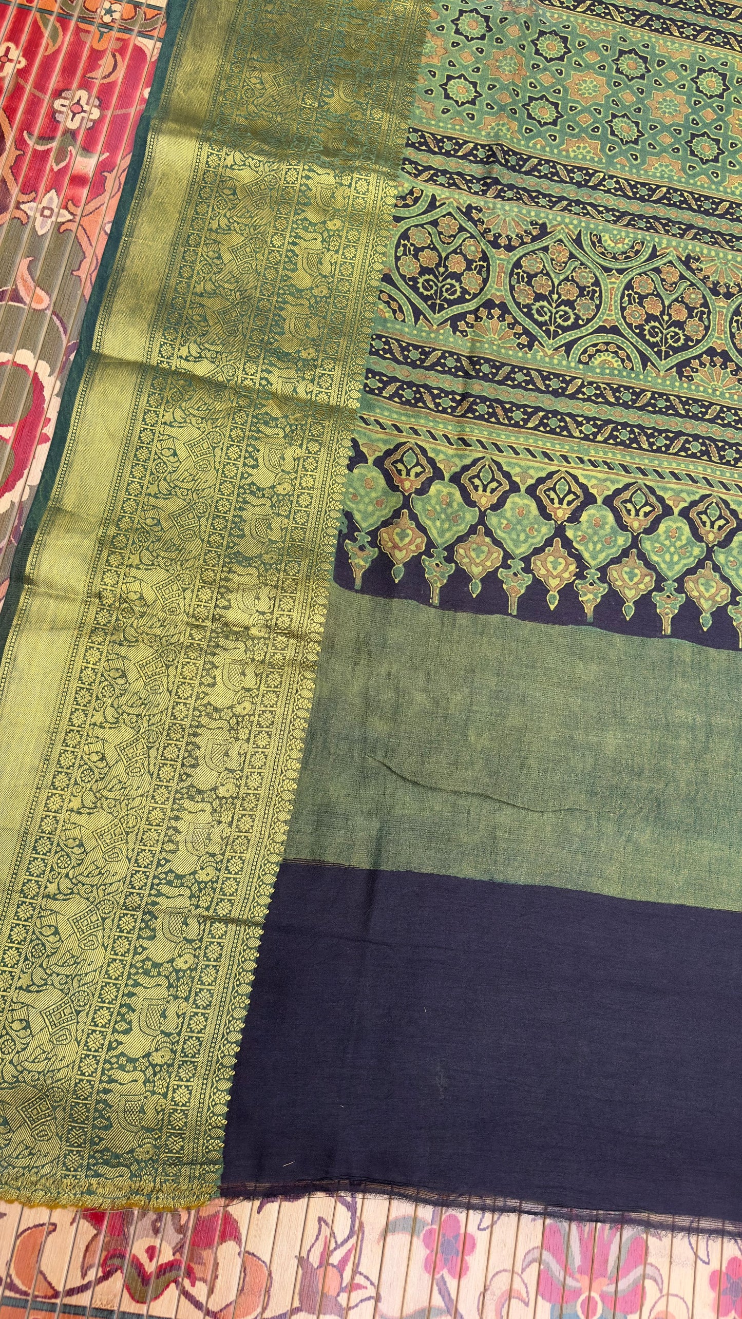 Hand block printed Ajrakh on chiniya silk