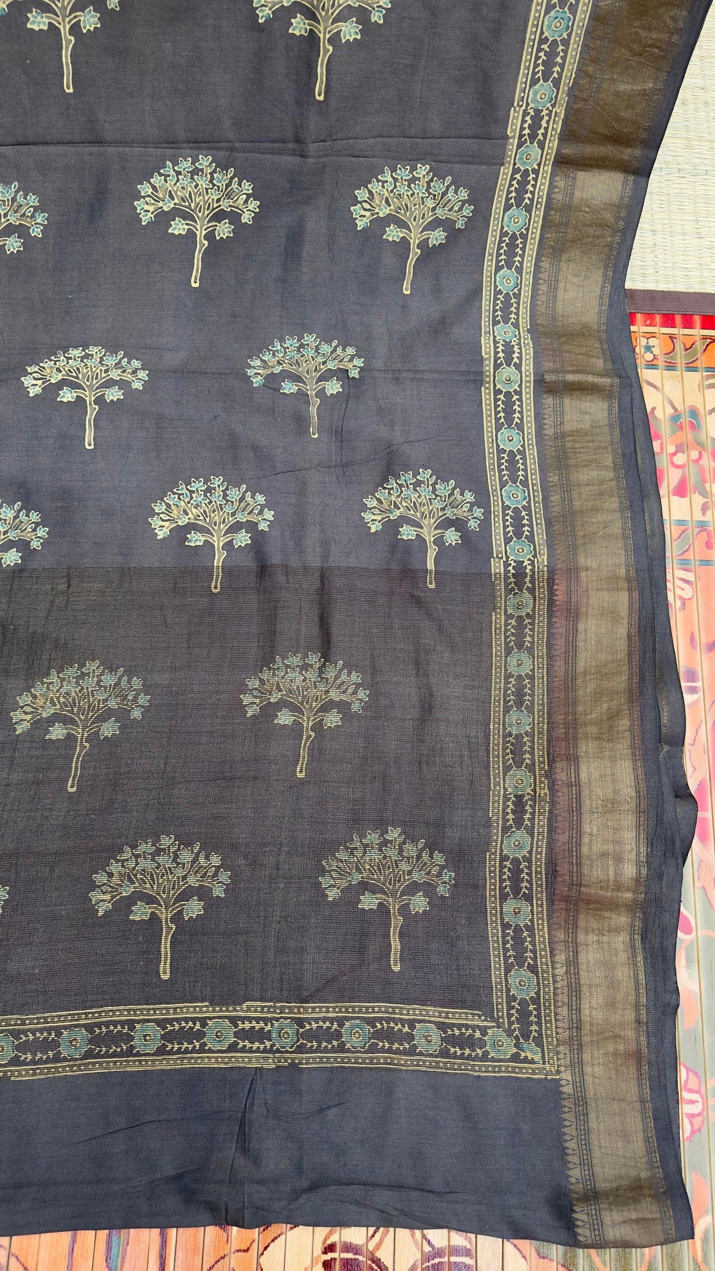 Hand block printed Ajrakh on chiniya silk