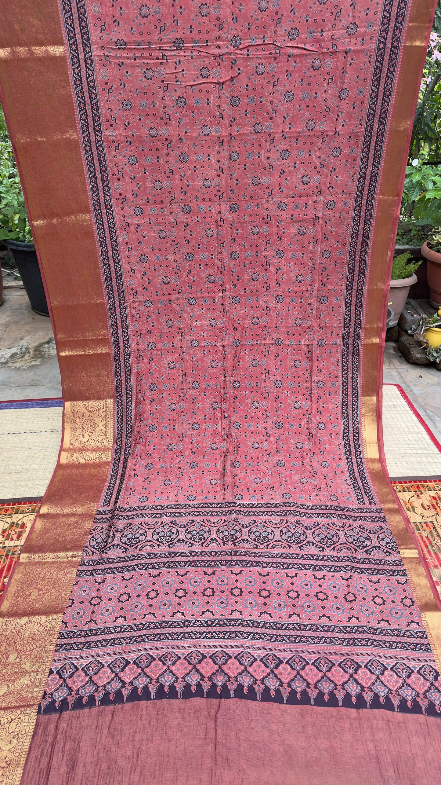 Hand block printed Ajrakh on chiniya silk