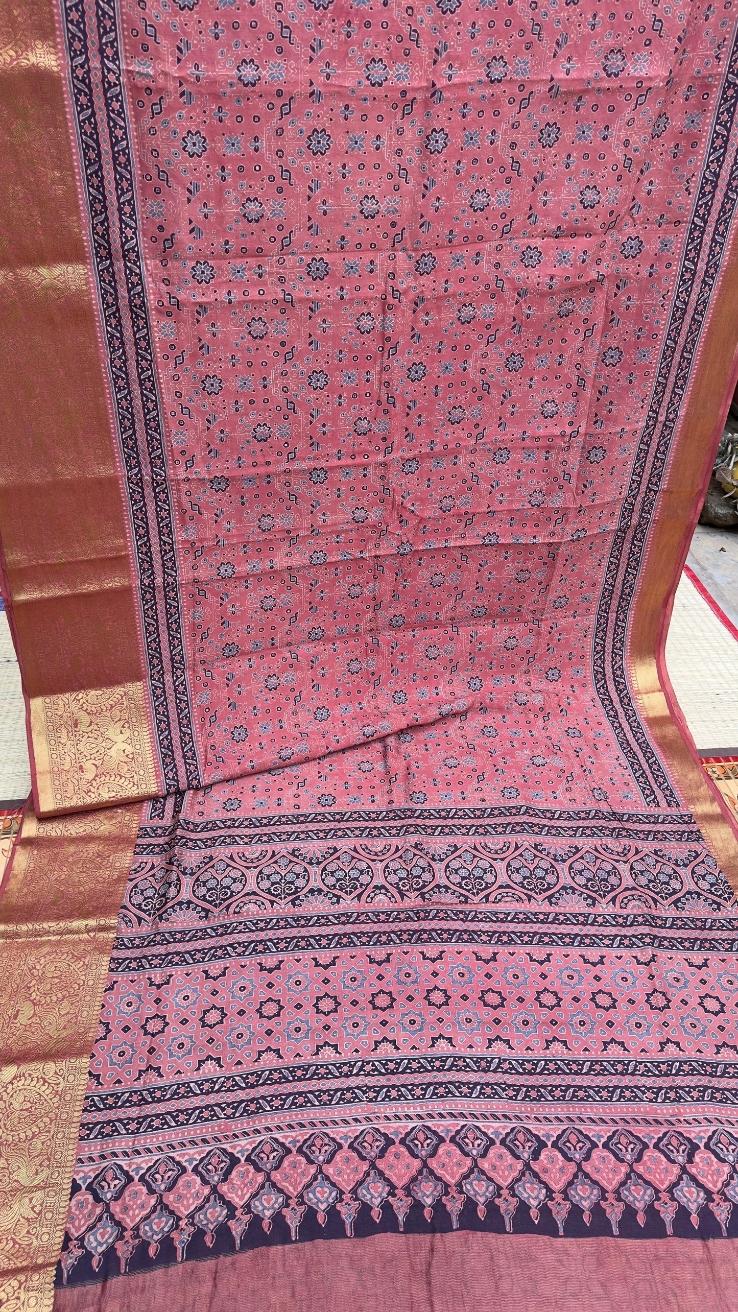Hand block printed Ajrakh on chiniya silk