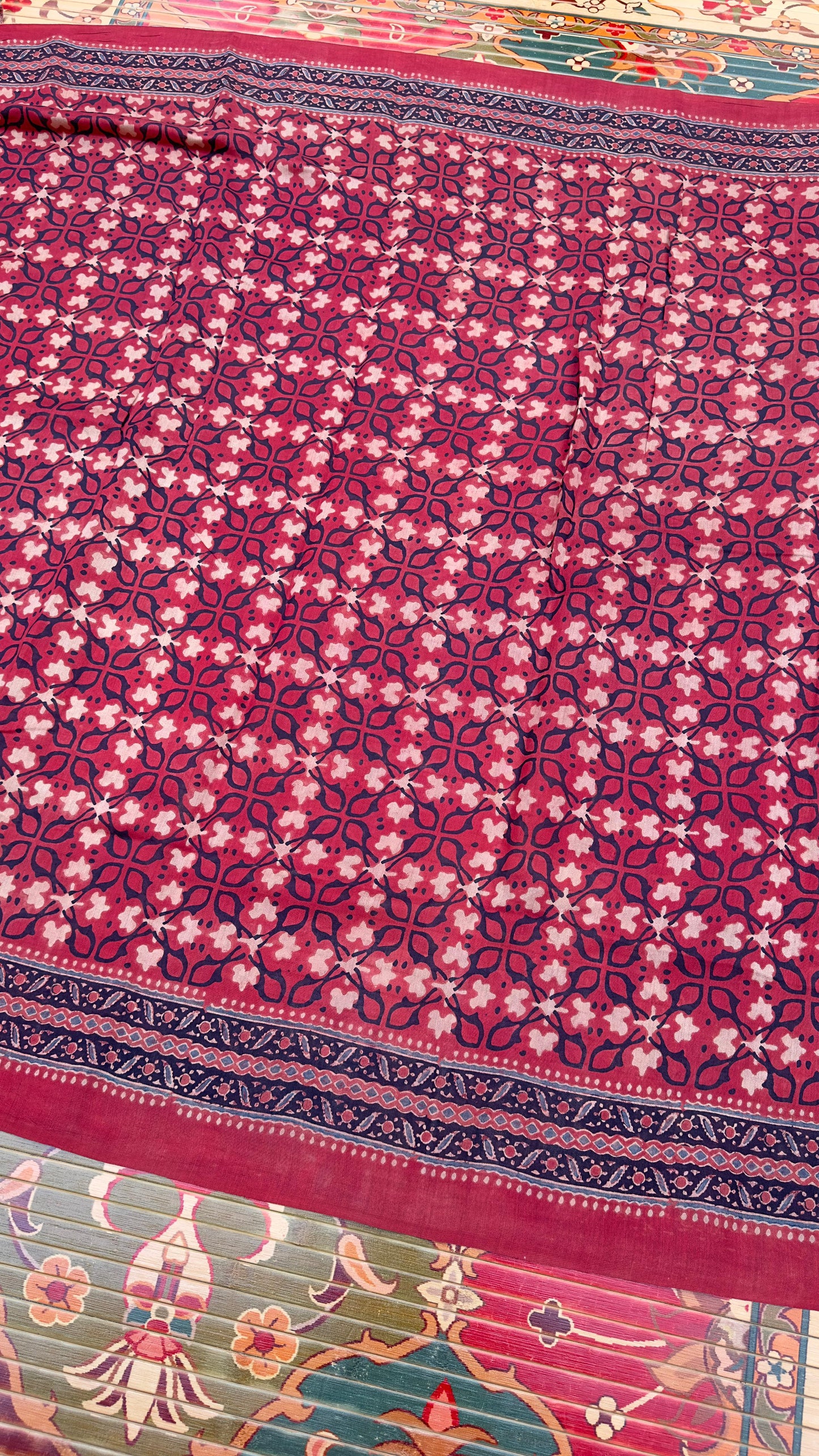 Hand block printed Ajrakh on chiniya silk