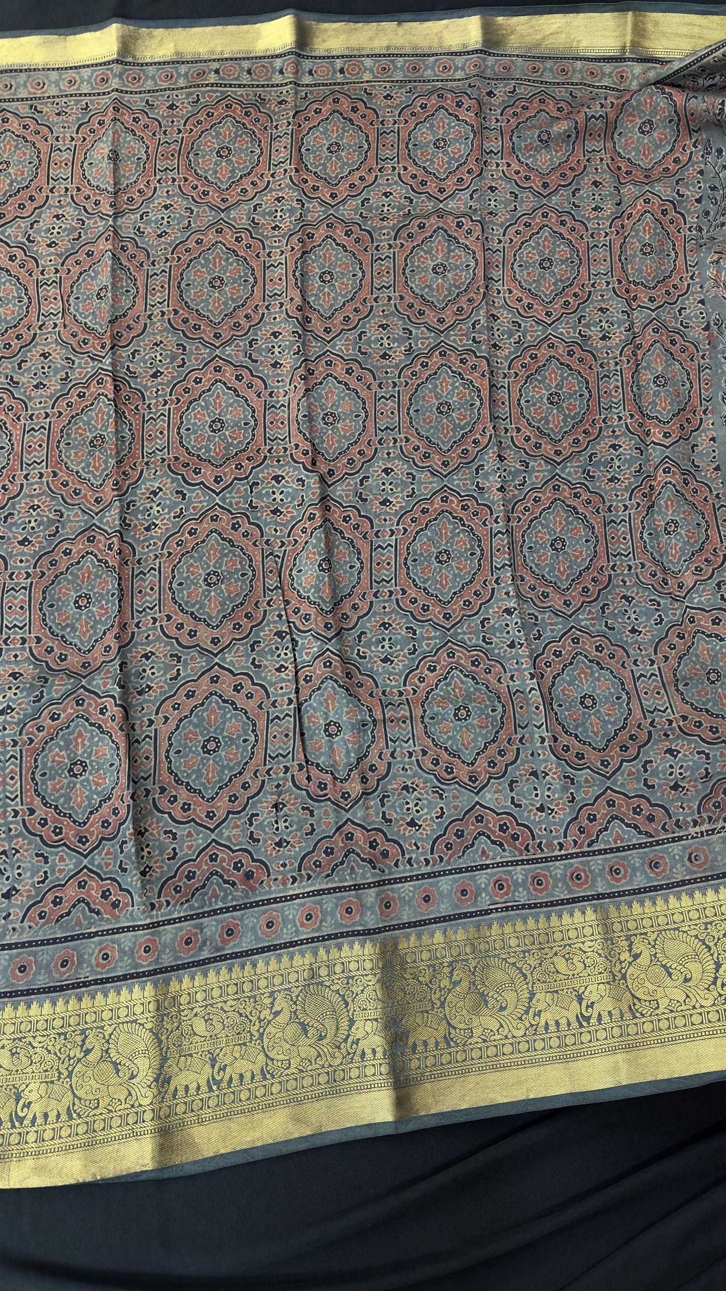Hand block printed Ajrakh on chiniya silk