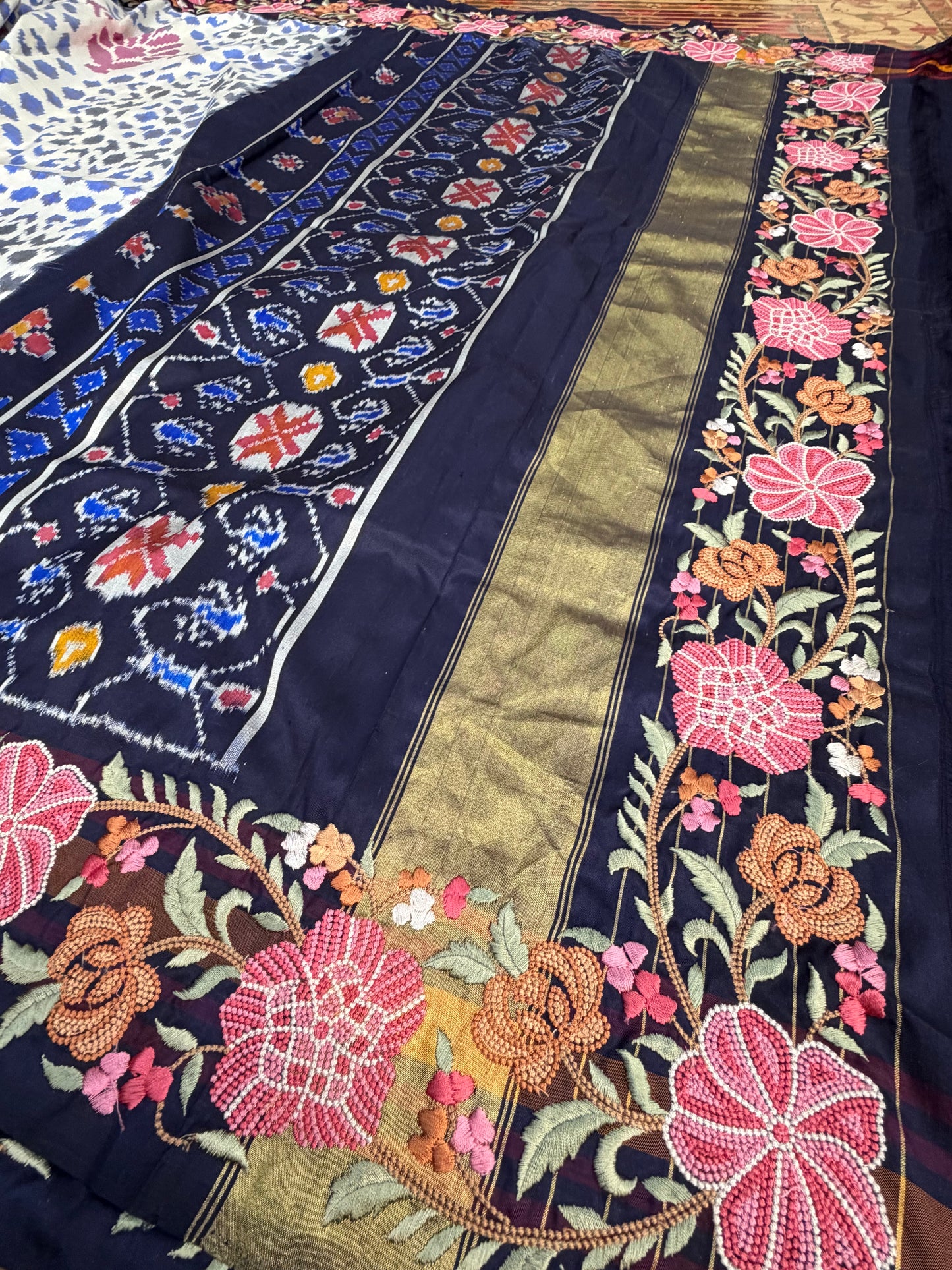 Pure silk handwoven ikkat with machine embroidery