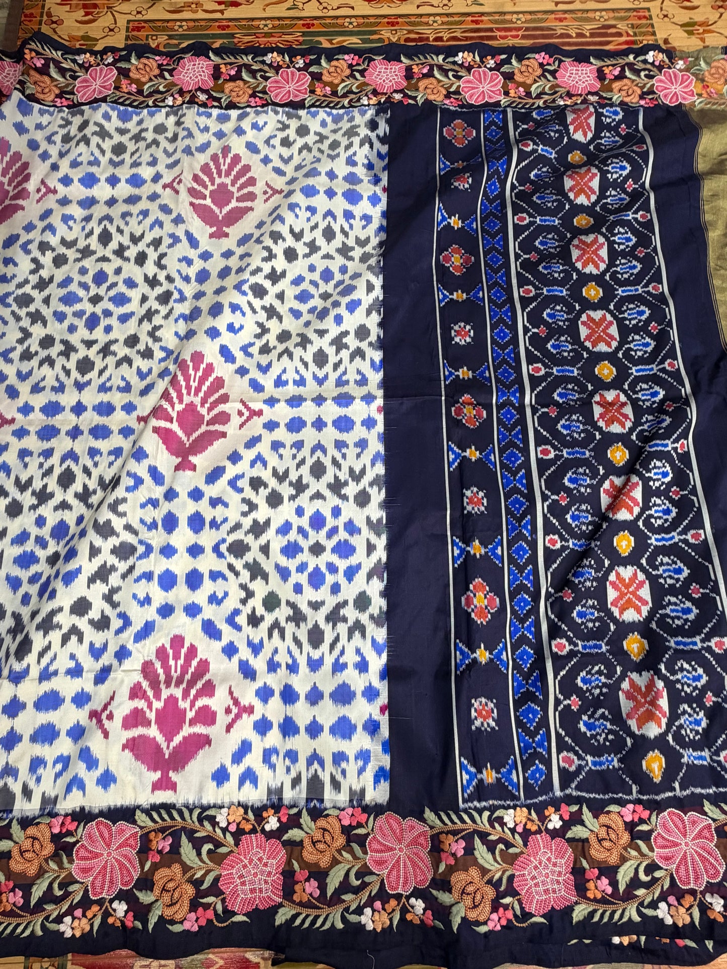 Pure silk handwoven ikkat with machine embroidery