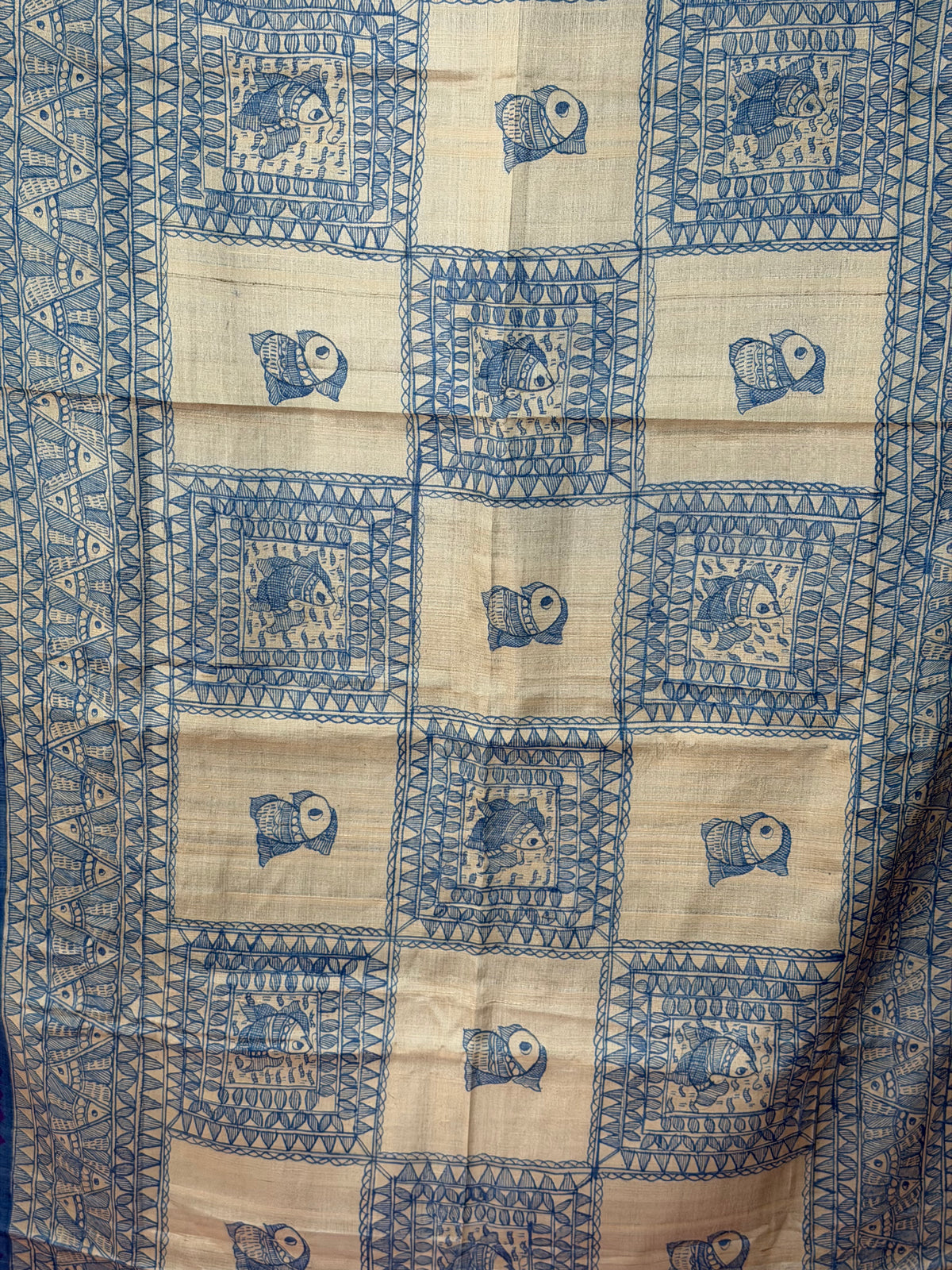 Tussar hand-drawn Madhubani and a handknotted Rai Bandhej saree
