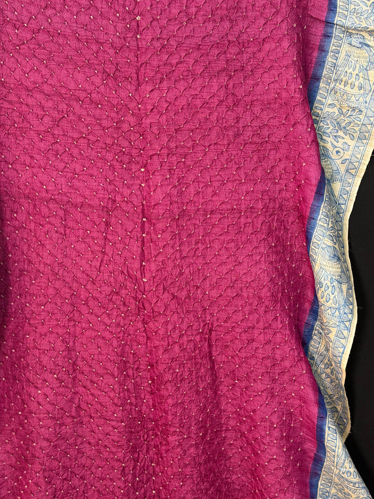 Tussar handknotted Bandhini with hand-drawn Madhubani saree.