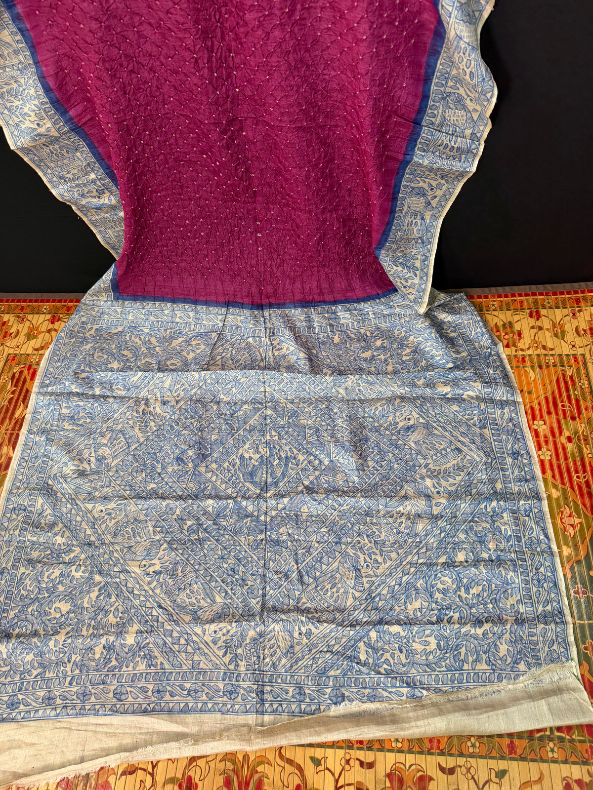 Tussar handknotted Bandhini with hand-drawn Madhubani saree.