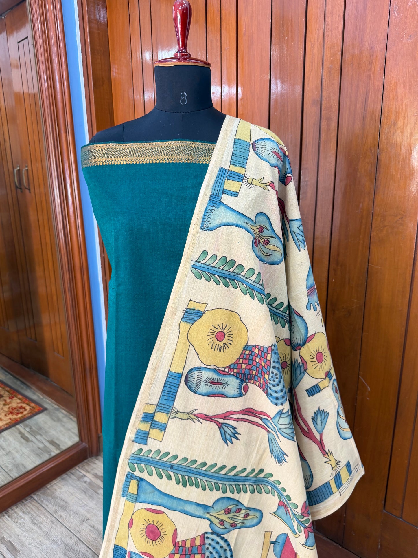 pure cotton kurti material paired with penkalamkari dupatta.