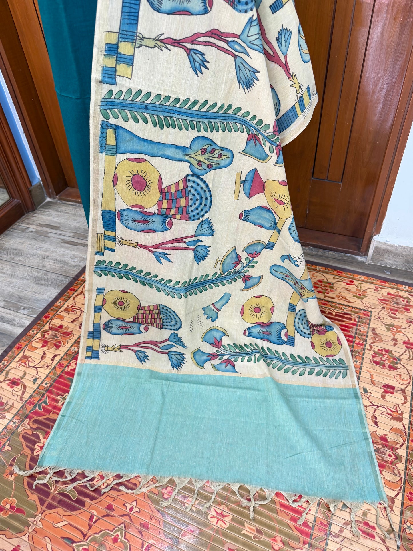 pure cotton kurti material paired with penkalamkari dupatta.