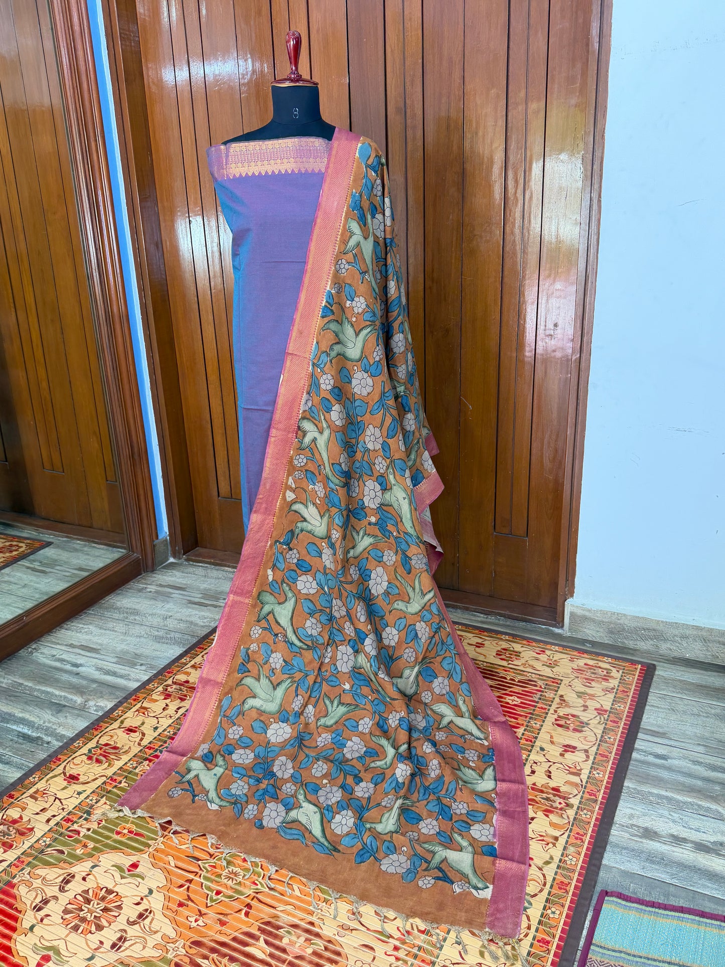 pure cotton kurti material paired with penkalamkari dupatta.