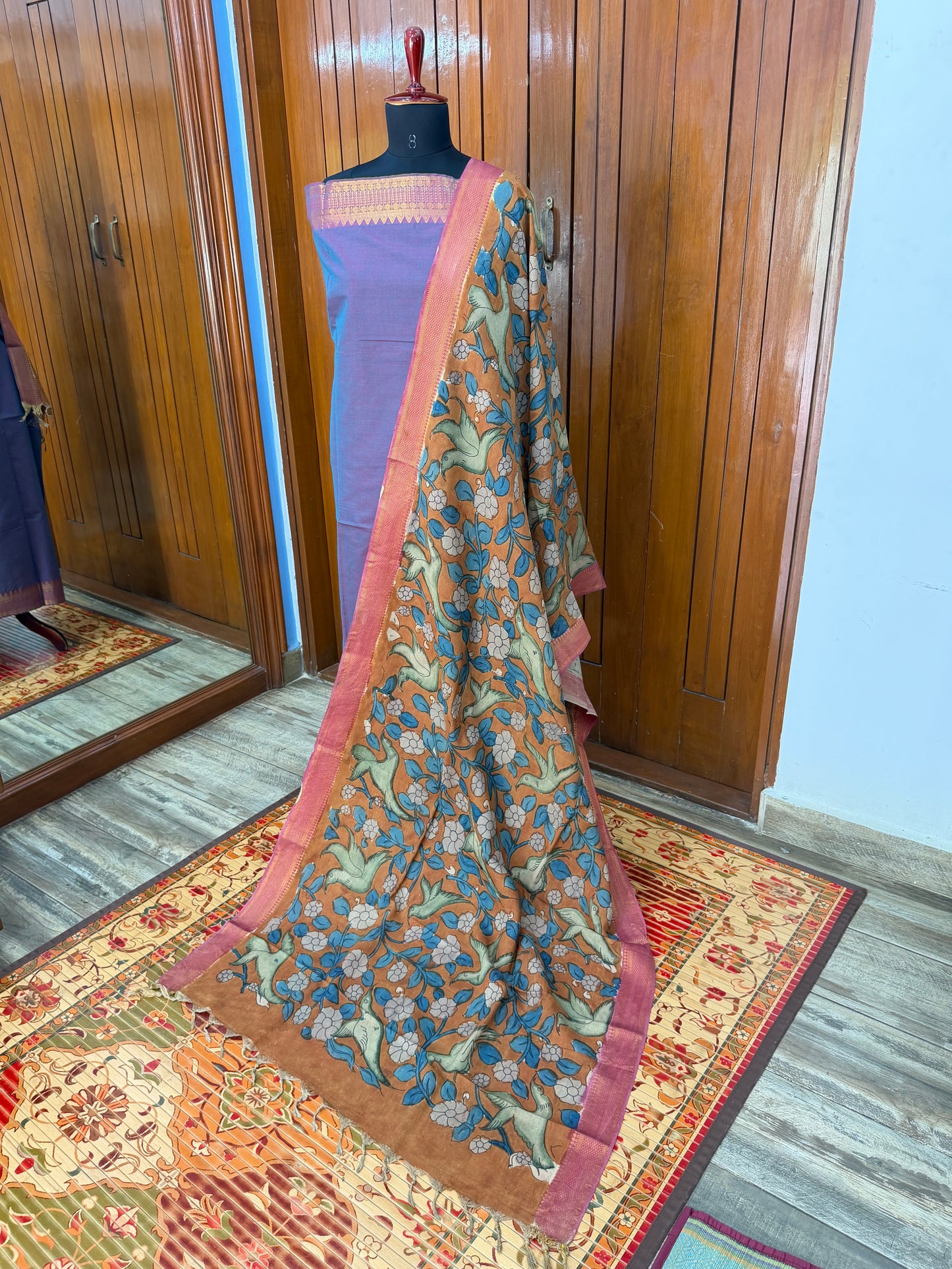pure cotton kurti material paired with penkalamkari dupatta.