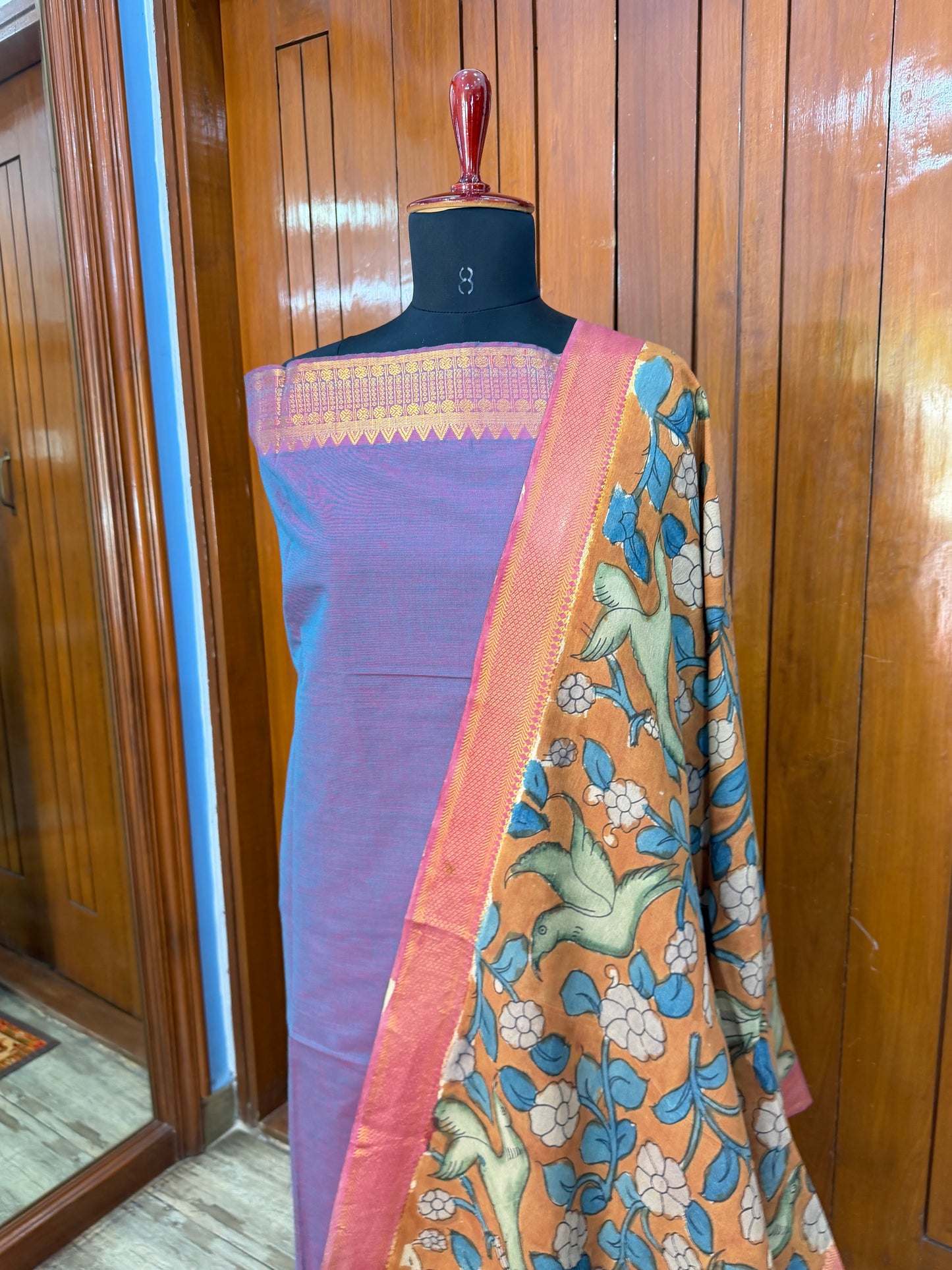pure cotton kurti material paired with penkalamkari dupatta.