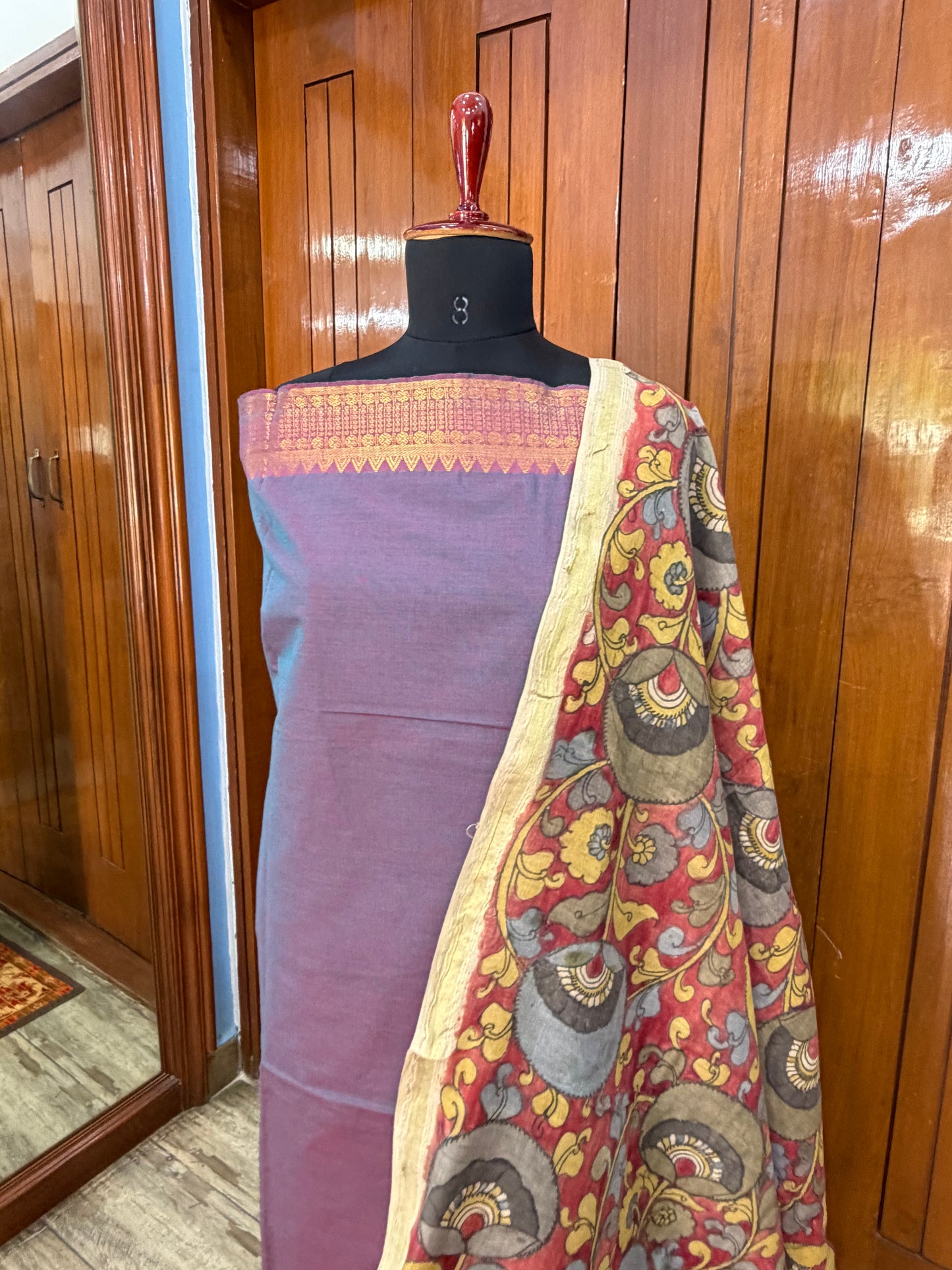 pure cotton kurti material paired with penkalamkari dupatta.