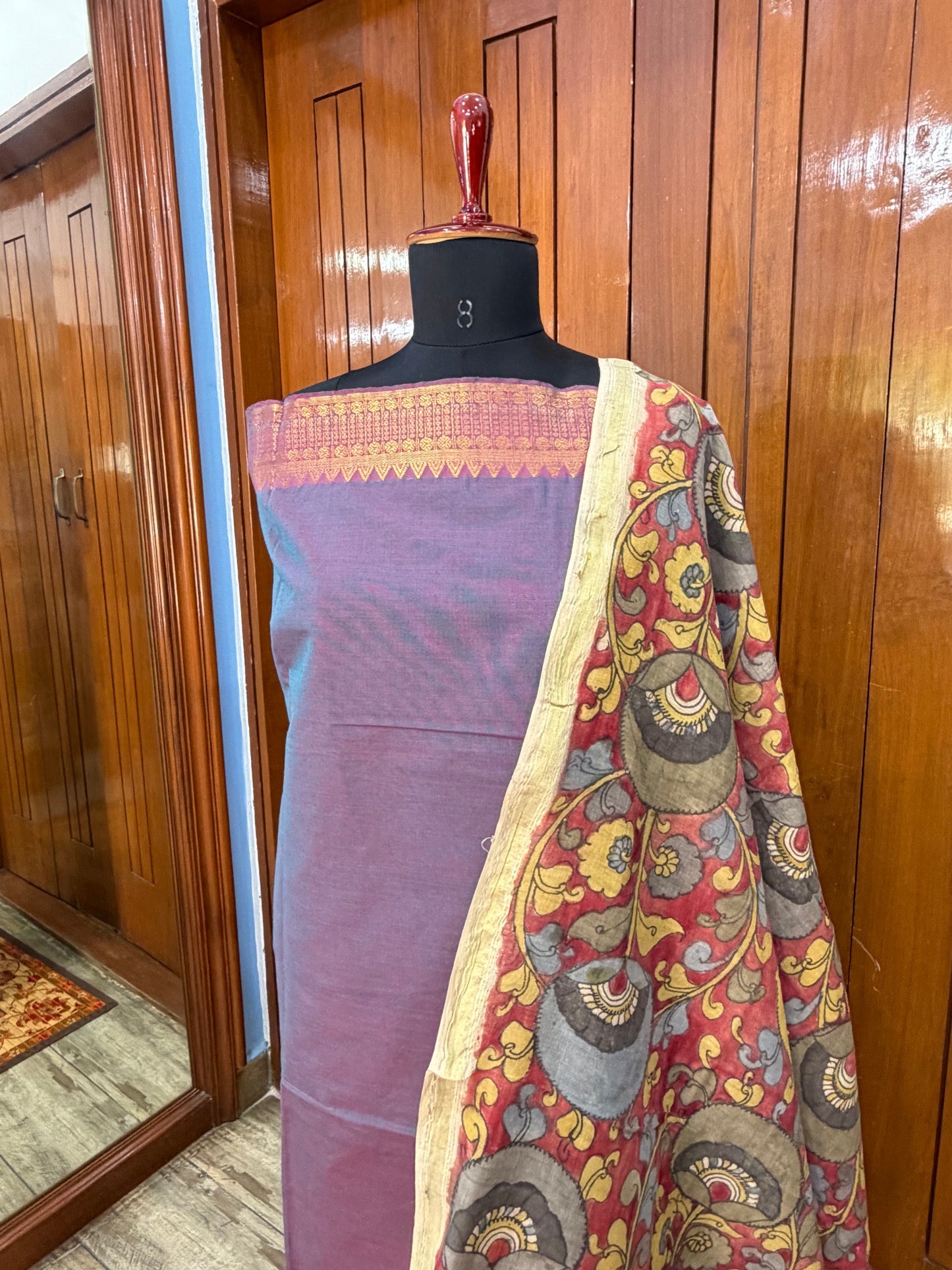 pure cotton kurti material paired with penkalamkari dupatta.