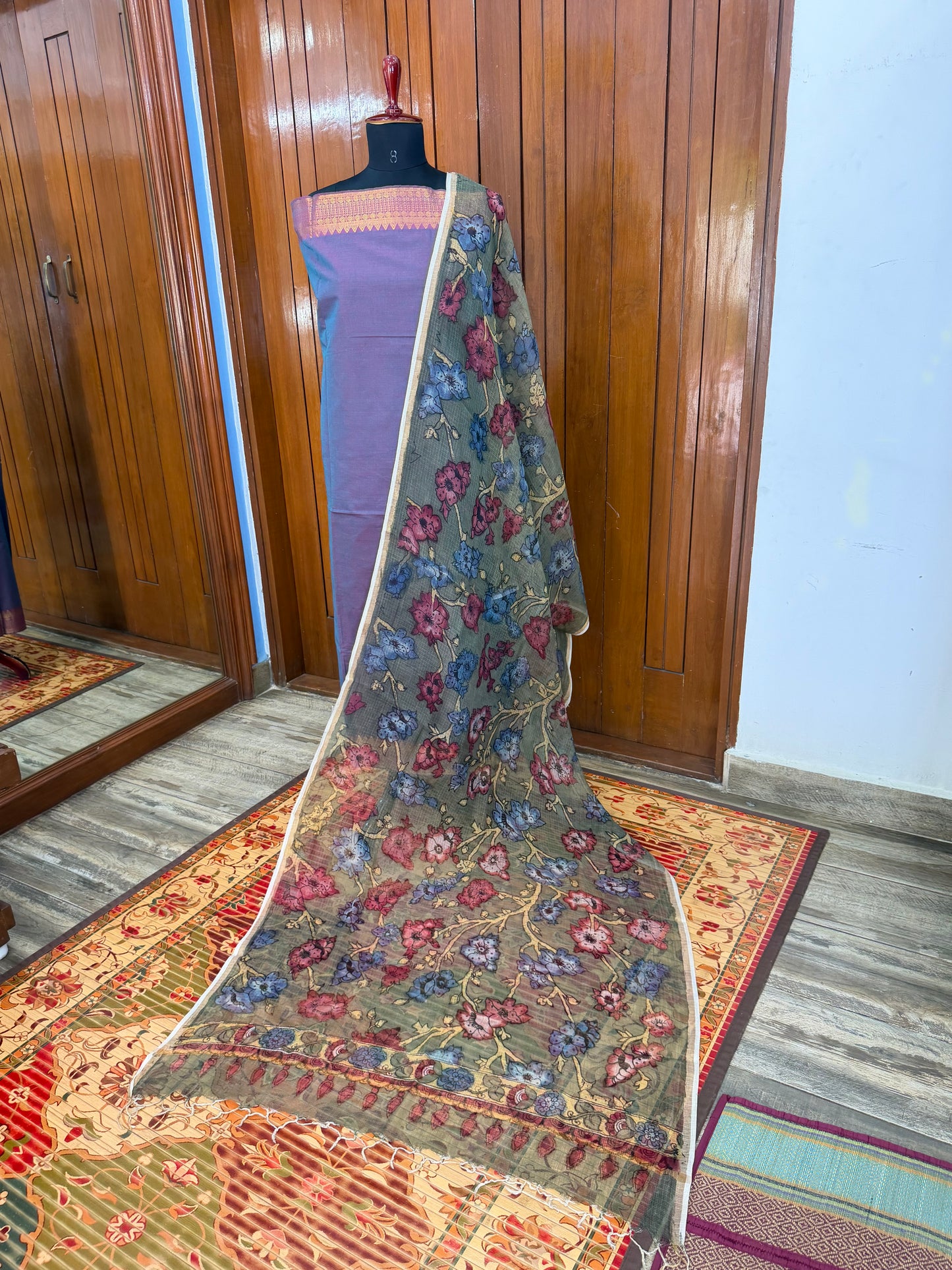 pure cotton kurti material paired with penkalamkari dupatta.