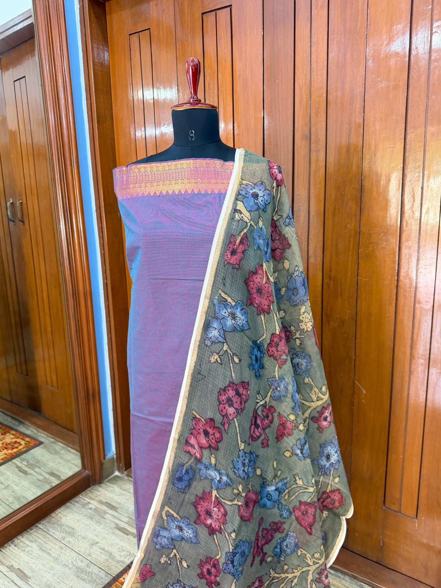 pure cotton kurti material paired with penkalamkari dupatta.