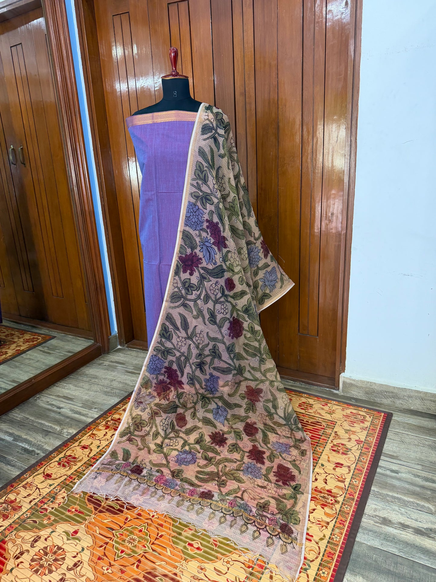 pure cotton kurti material paired with penkalamkari dupatta.