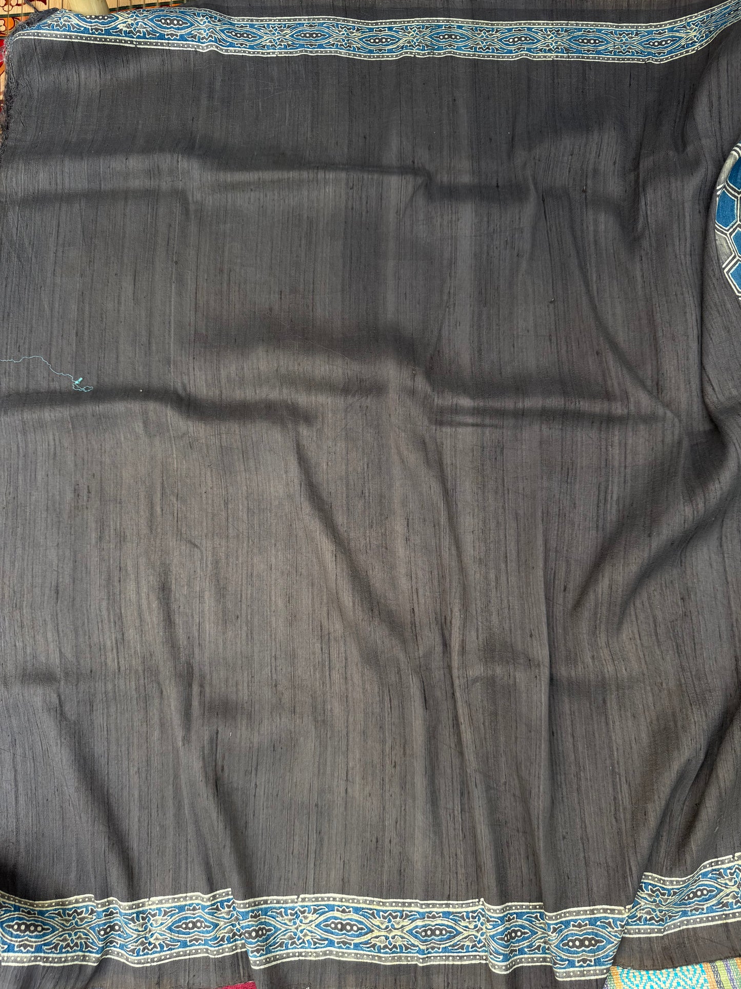 Handblock printed Ajrakh on raw silk sarees