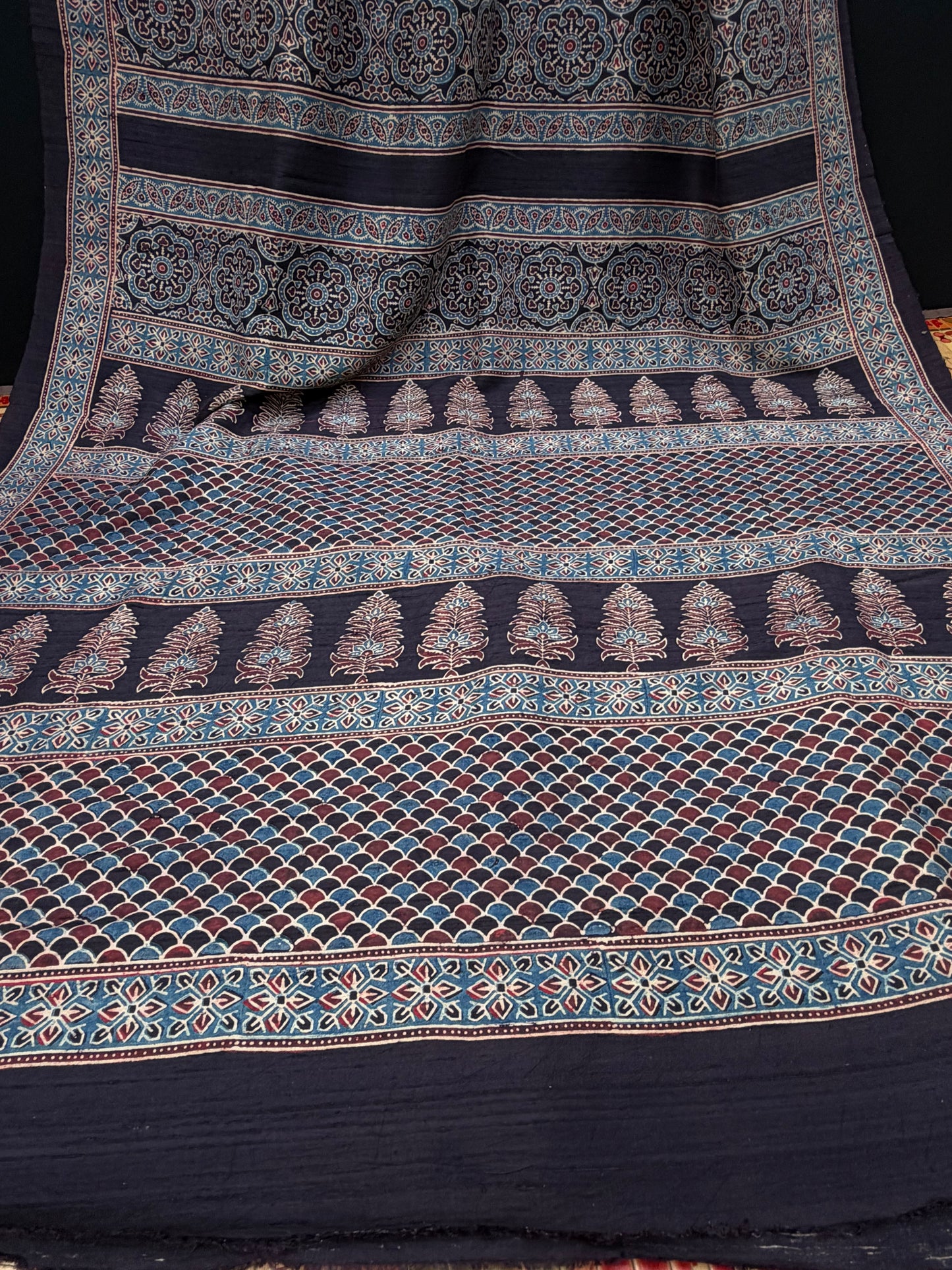 Handblock printed Ajrakh on raw silk sarees
