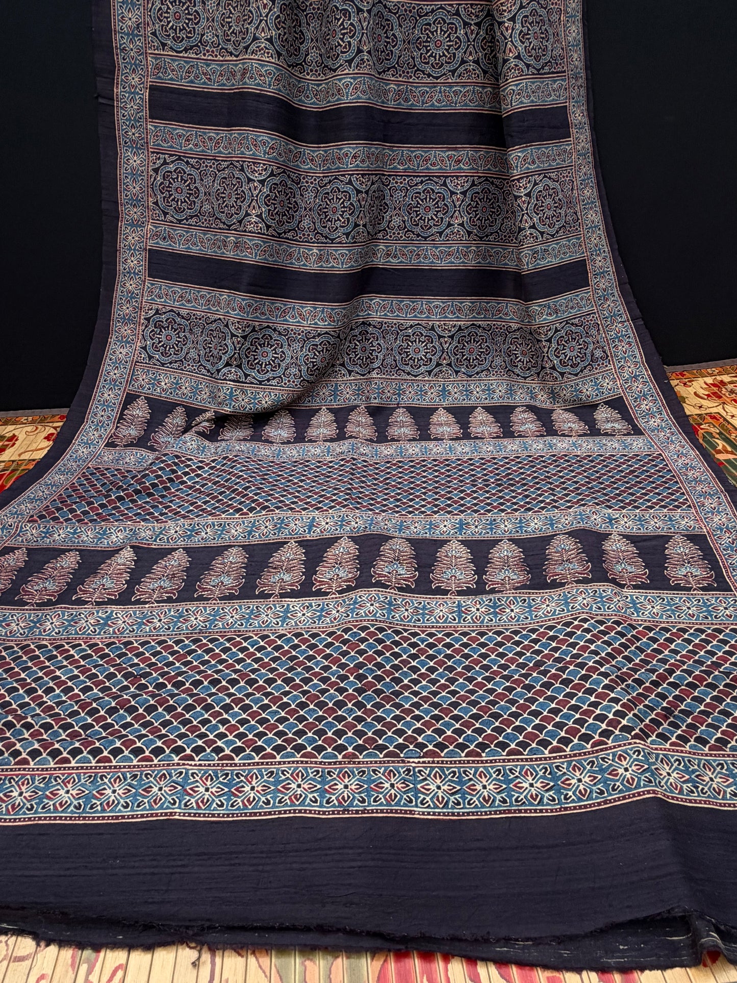 Handblock printed Ajrakh on raw silk sarees