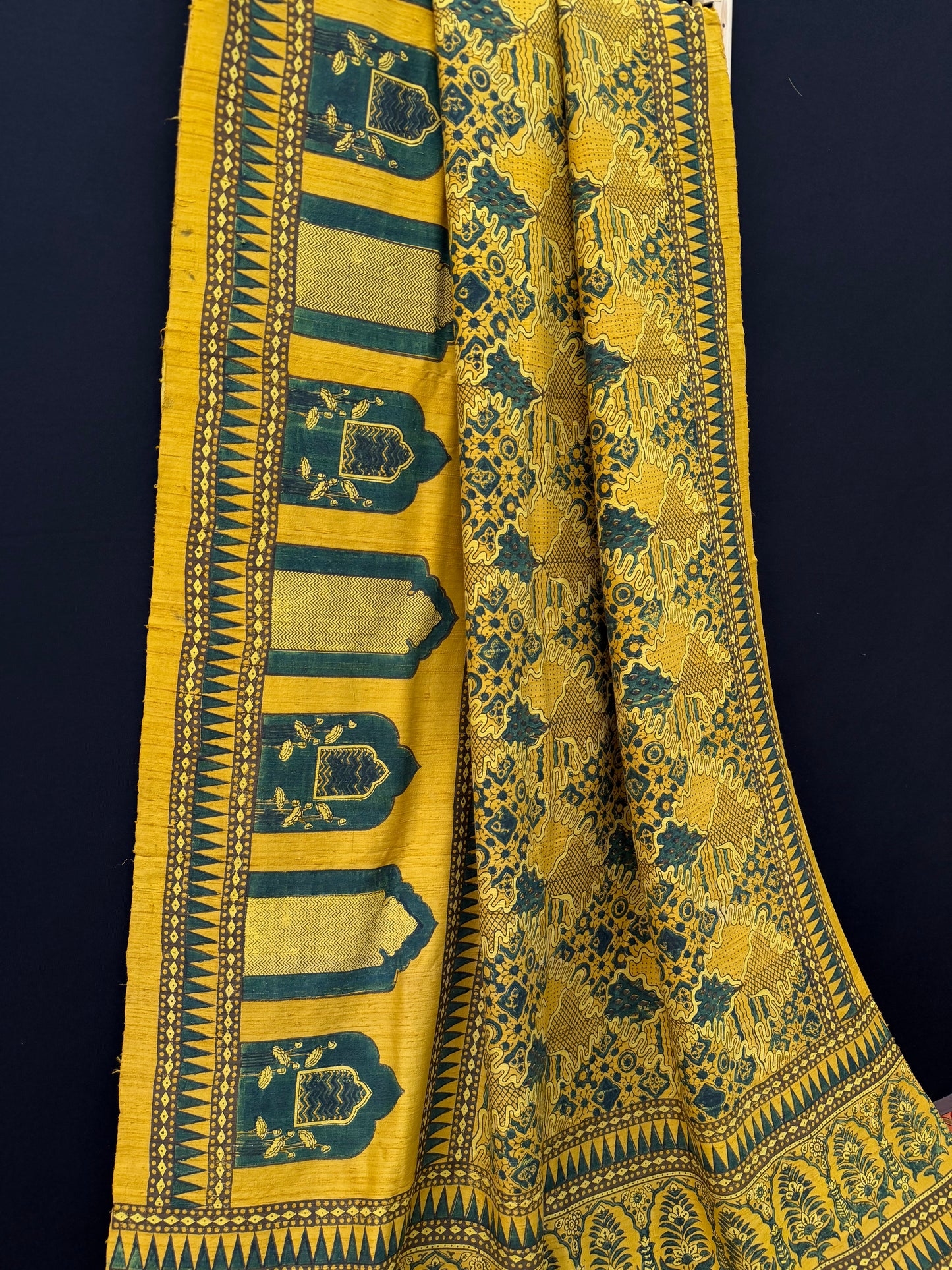 Handblock printed Ajrakh on raw silk sarees