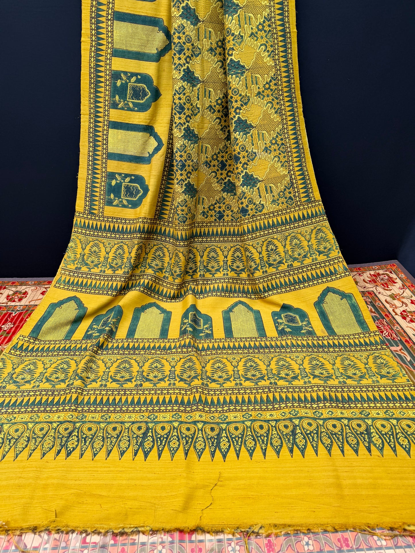 Handblock printed Ajrakh on raw silk sarees