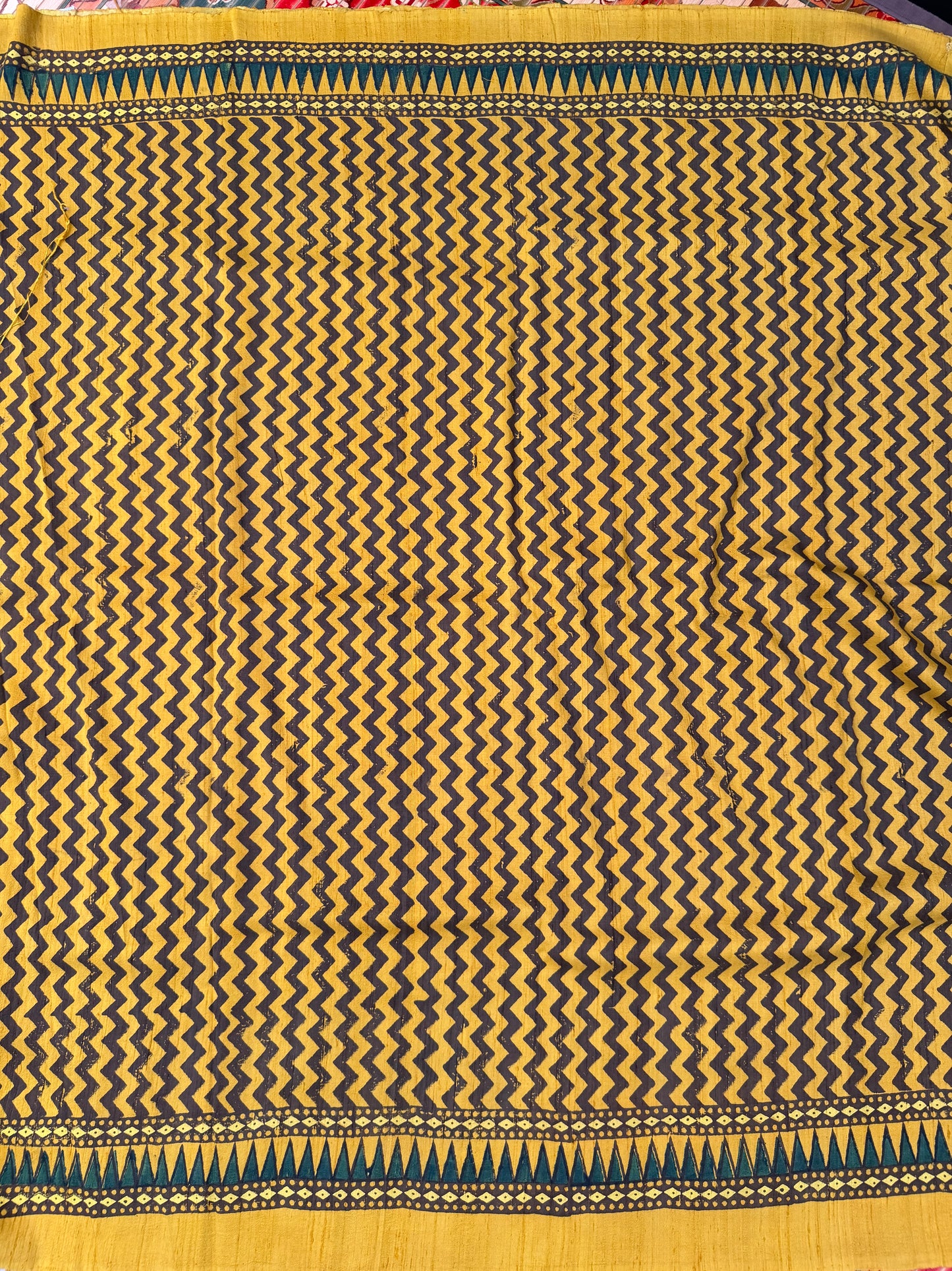 Handblock printed Ajrakh on raw silk sarees