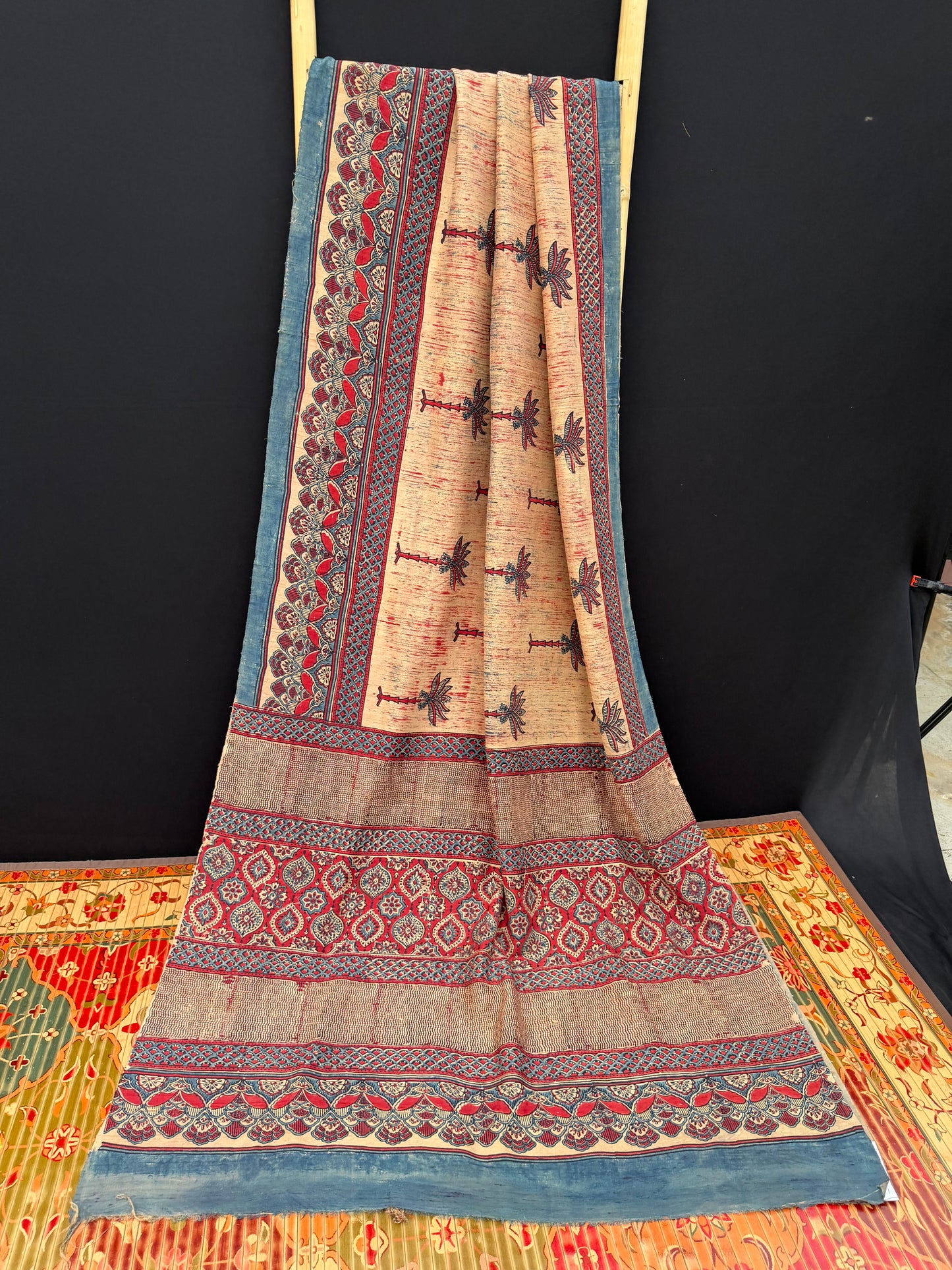 Handblock printed Ajrakh on raw silk sarees
