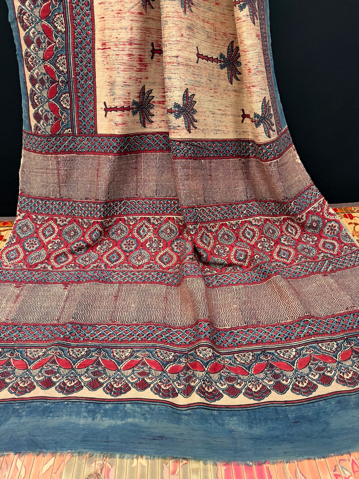 Handblock printed Ajrakh on raw silk sarees