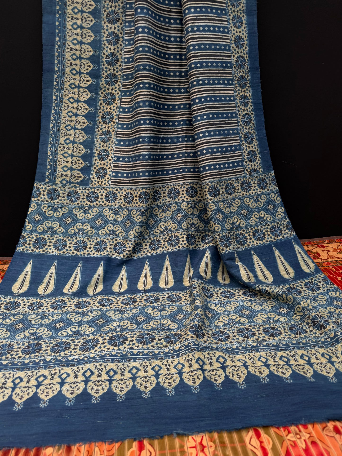 Handblock printed Ajrakh on raw silk sarees
