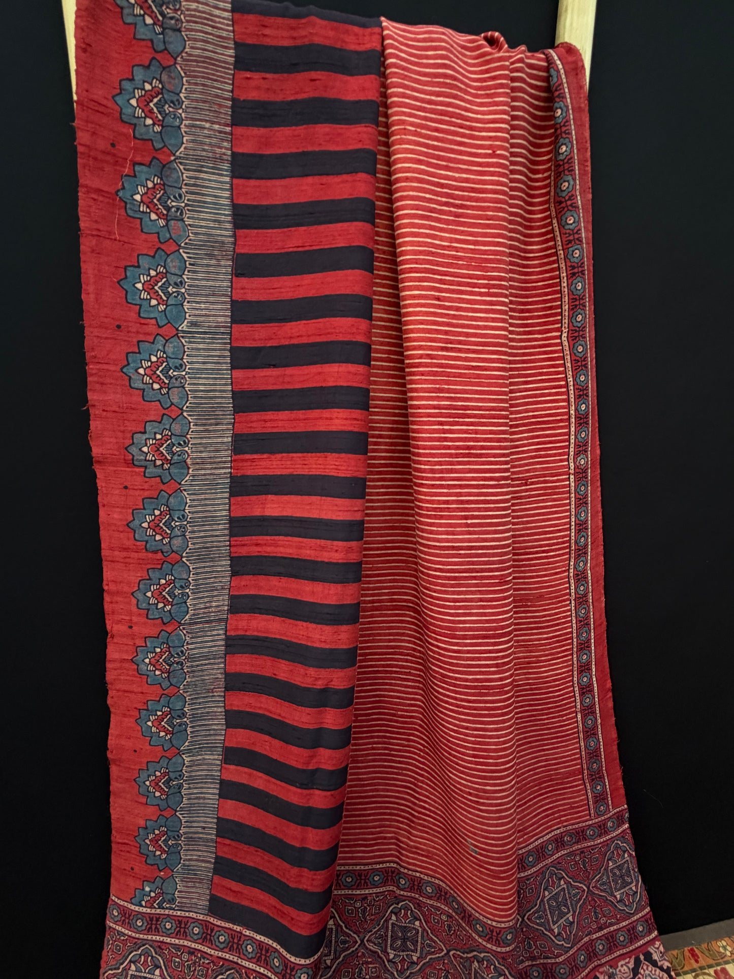 Handblock printed Ajrakh on raw silk sarees