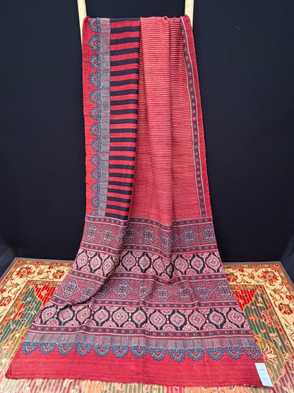 Handblock printed Ajrakh on raw silk sarees