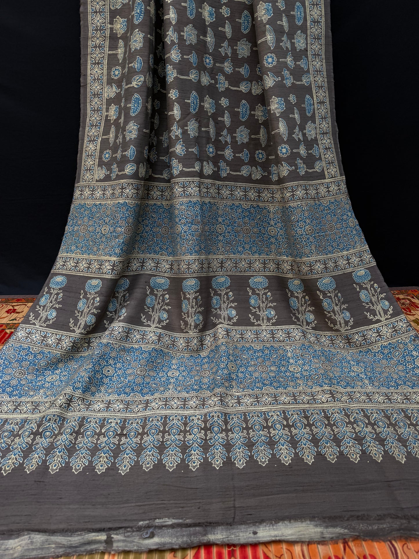 Handblock printed Ajrakh on raw silk sarees