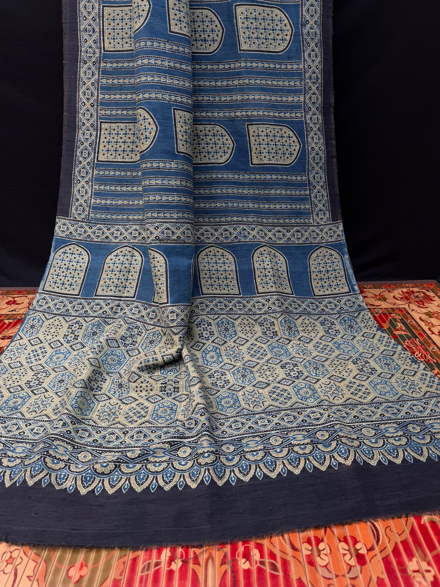 Handblock printed Ajrakh on raw silk sarees