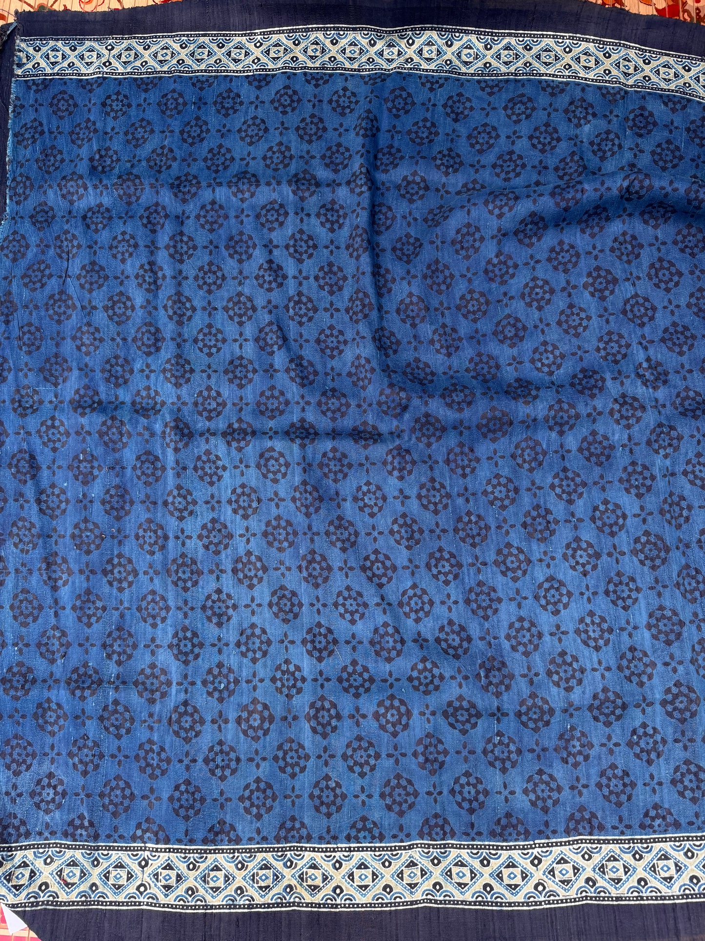 Handblock printed Ajrakh on raw silk sarees