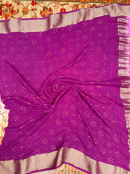 Pure benaras crepe with handknotted bandhini pallus & blouses.