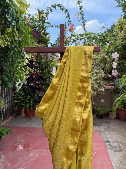 Pure benaras crepe with handknotted bandhini pallus & blouses.
