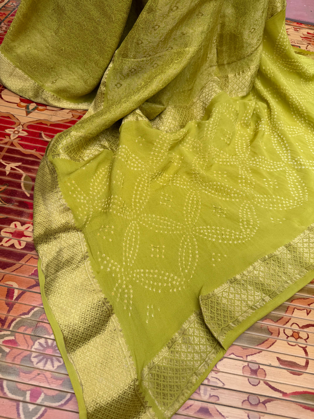 Pure benaras crepe with handknotted bandhini pallus & blouses.