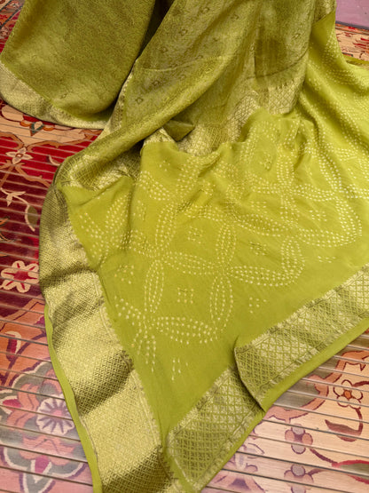 Pure benaras crepe with handknotted bandhini pallus & blouses.