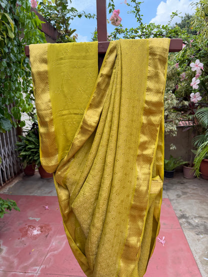 Pure benaras crepe with handknotted bandhini pallus & blouses.