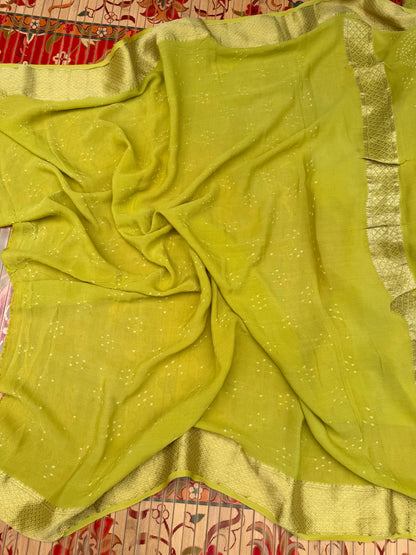 Pure benaras crepe with handknotted bandhini pallus & blouses.